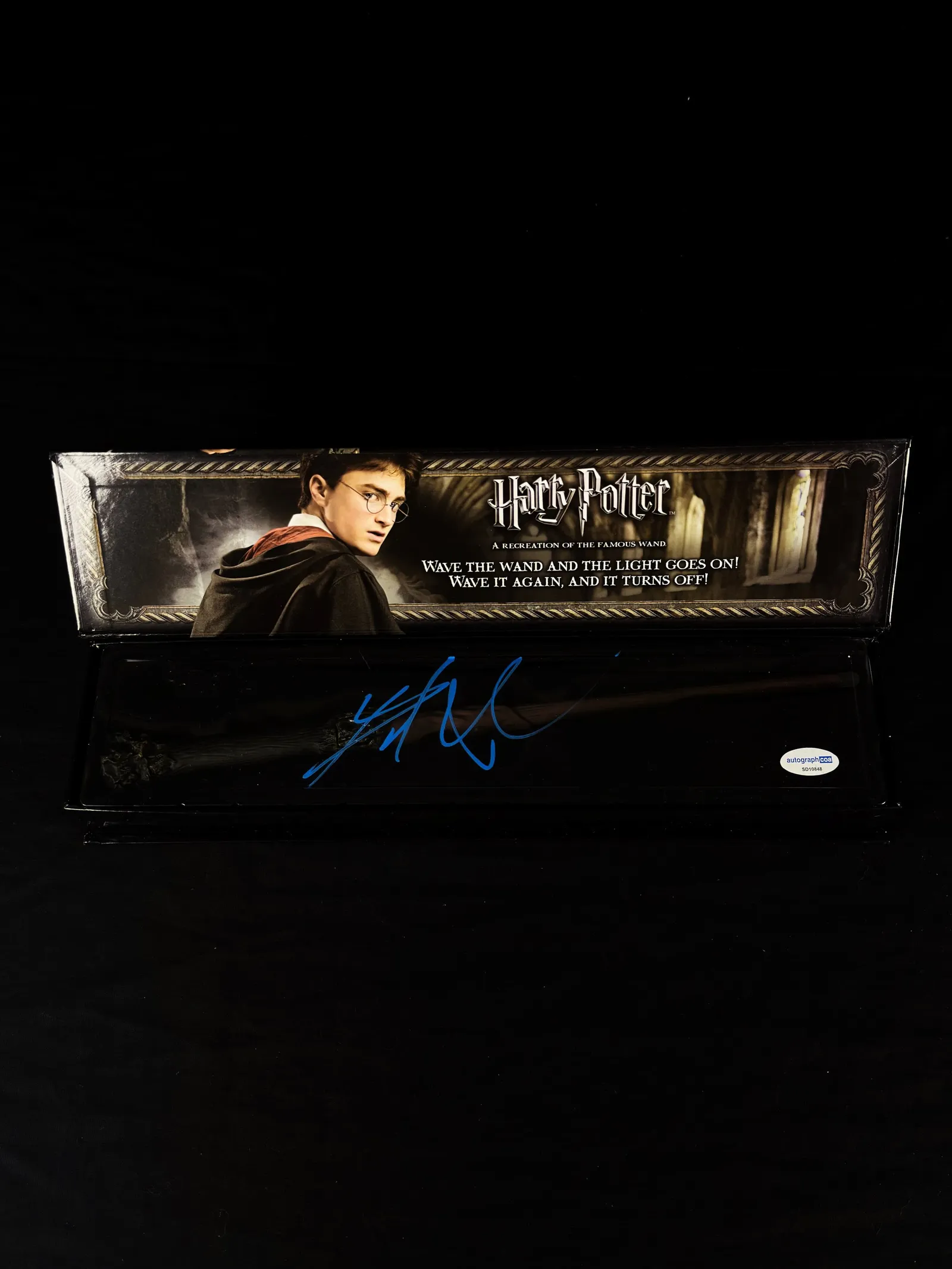 Daniel Radcliffe autógrafo – varinha iluminada, Harry Potter, Daniel Radcliffe