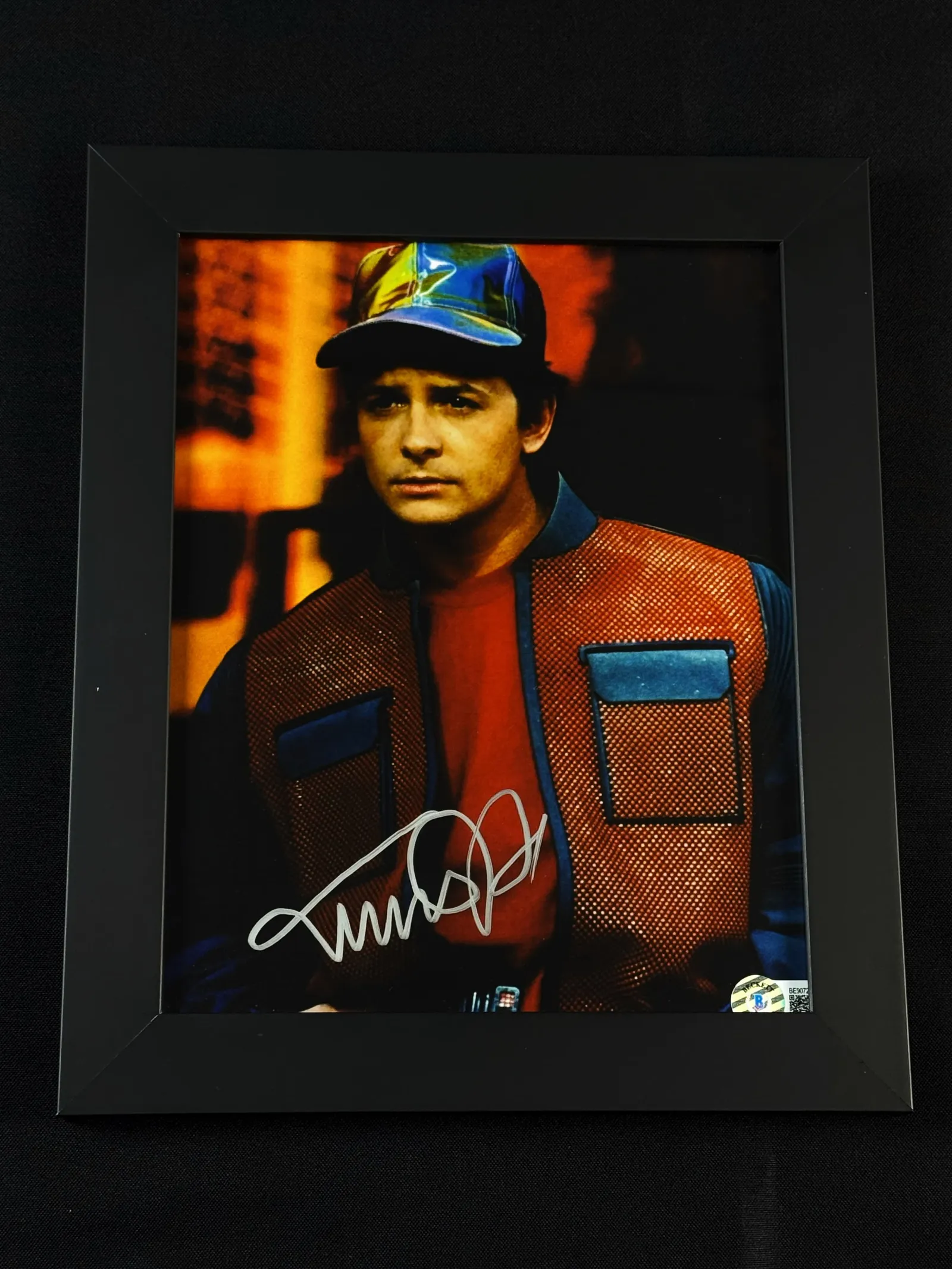Michael J. Fox autógrafo – quadro em cena do filme "De Volta para o Futuro 2", Michael J. Fox