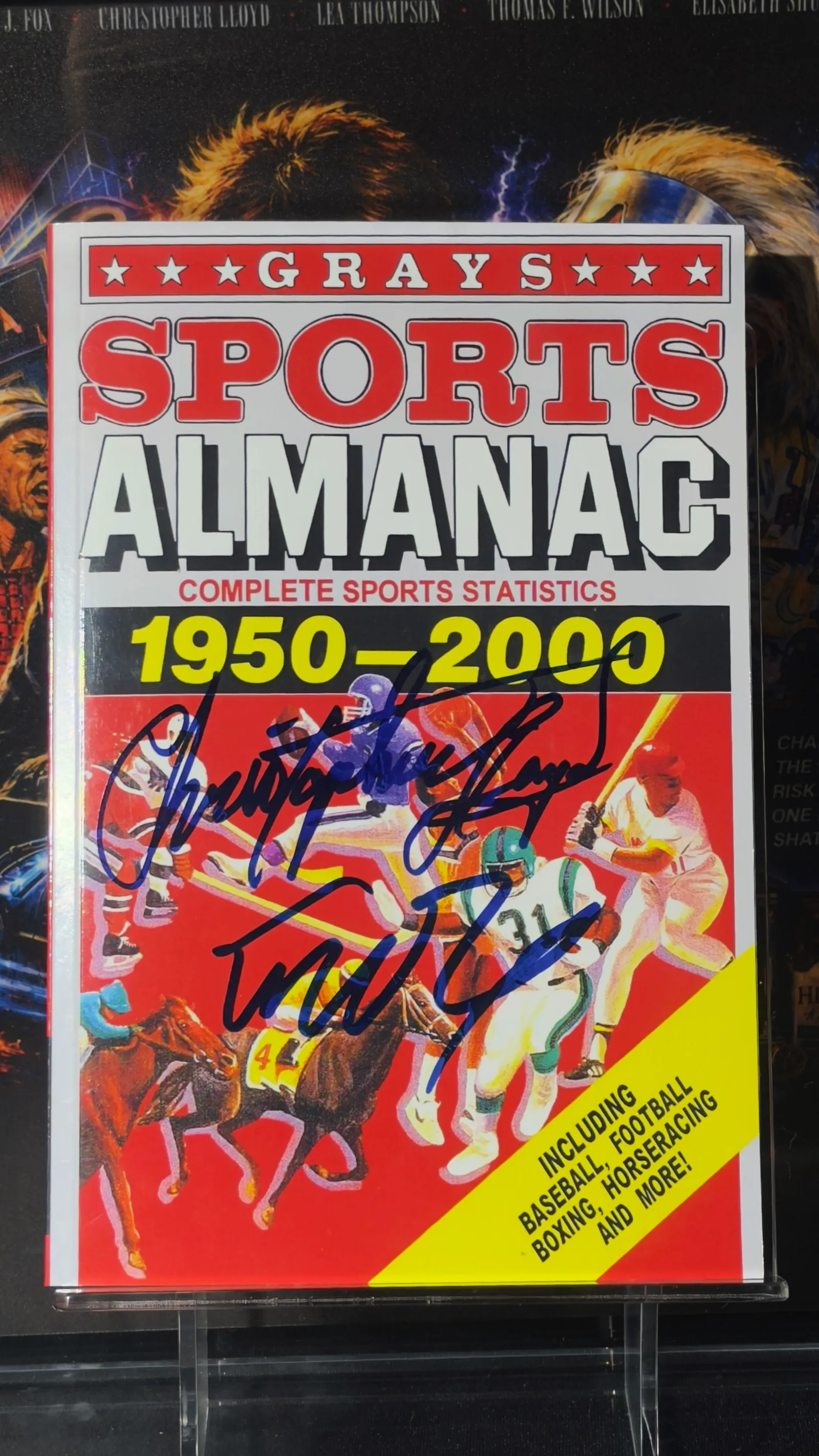 Michael J. Fox e Christopher Lloyd autógrafos – livro Grays Sports Almanac, Michael J. Fox e Christopher Lloyd